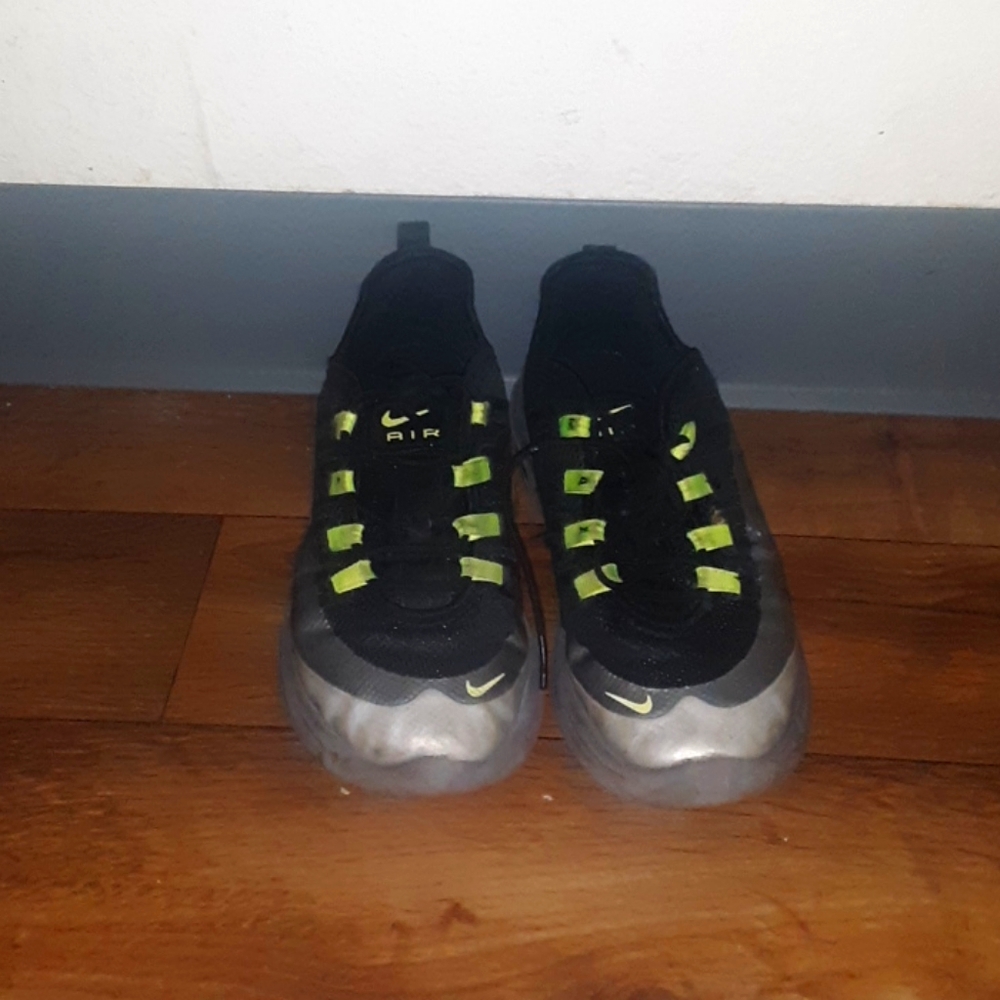 Green and black Nike air max.